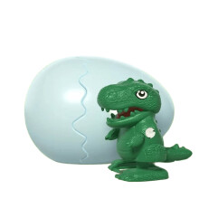Opwindbaar dinosaurusspeelgoed dat uit een ei breekt en mechanisch kan lopen.