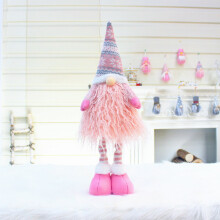 Pink Christmas gnome plush toy with extendable legs