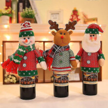 Kersttafeldecoratieset met kerstman, sneeuwpop en wijnfles