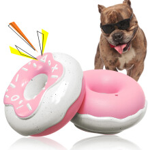 Juguete masticable para perros con forma de rosquilla que emite un chirrido.