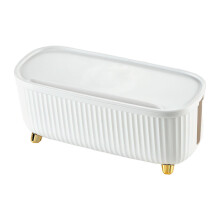 Caja blanca para gestión de cables con aberturas en forma de U.