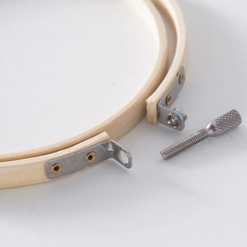 Complete beginner embroidery kit including: 5 bamboo embroidery hoops, 50 brightly colored threads, 2