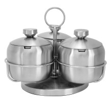 Juego de botes giratorios de acero inoxidable para especias con rejilla.