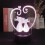 Veilleuse LED 3D en forme de chat avec télécommande et socle noir 1