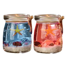 Bougie parfumée artisanale sur le thème de l'océan et des coquillages