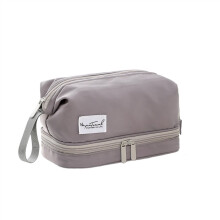 Make-up tas met dubbele laag, draagbaar en met grote capaciteit.