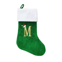 Monogramm-Weihnachtsstrumpf aus grünem Samt mit weißem Bündchen