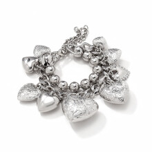 Conjunto de pulseras de corazón con cuentas doradas y diseño apilado