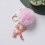 Chaveiro rosa com pompom e 26 letras em resina. 1