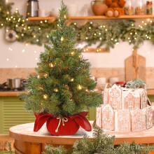 Weloille 24-inch pre-lit flocked mini Christmas tree with