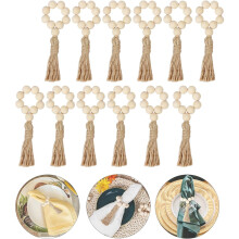 Ronds de serviette en perles de bois avec pompons (6 ou 12 pièces)