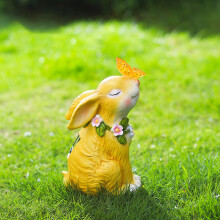 Statue de lapin lumineuse solaire pour jardin avec papillon et fleur