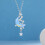 Colar feminino com pingente de lua e estrelas em strass prateado 1