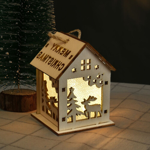 Christmas wooden cabin window display tree