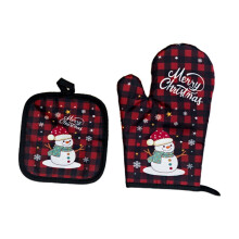 Ensemble de gants de cuisine et de dessous de plat isolés Père Noël