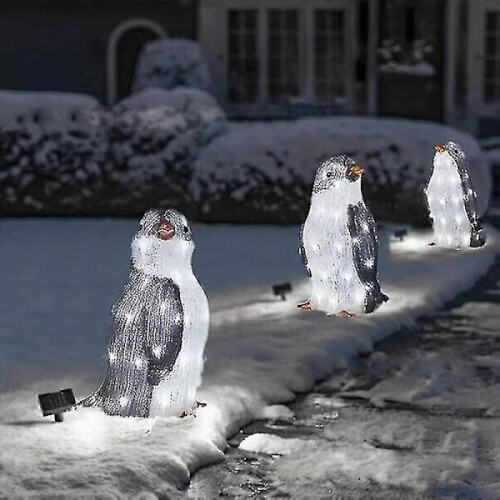 Luzes de Natal LED em formato de pinguim para decoração externa.
