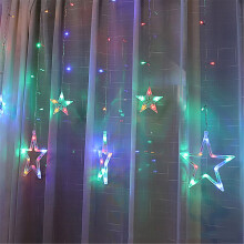 Guirlande lumineuse LED étoiles de Noël pour décorer un rideau