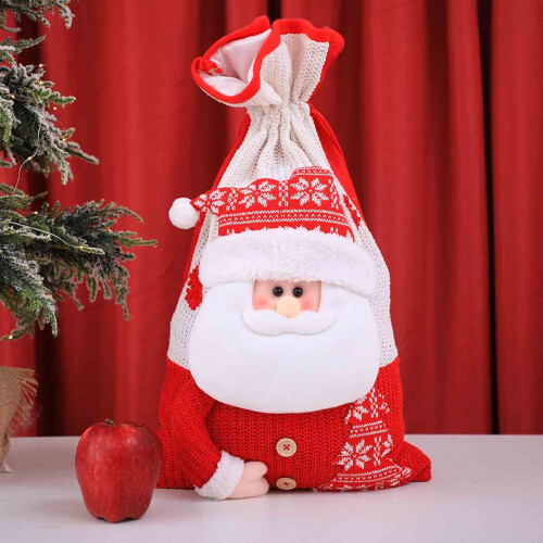 Stor stickad julklappspåse med dragsko