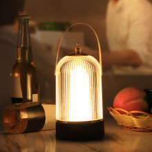 Luminária de mesa LED portátil com controle por toque, em formato de gaiola de pássaro.
