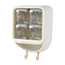 Estante para especias de pared con recipientes y cucharas.