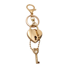 Modieuze tweekleurige hartsleutelhanger,-Gouden vismondgesp ke