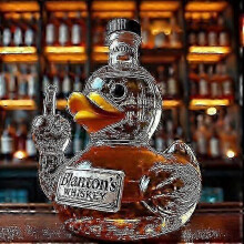 (Duck C) Geschikt voor een whiskykaraf van 350 ml. Fles in de vorm van een Amerikaanse zeearend, teckel of uil, of een adelaar.