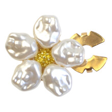 Manschettenknopf aus poliertem Metall in Blumenform, elegantes