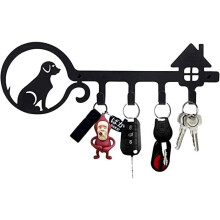 Wall-mounted key holder, iron hooks in the shape of animals, for storing keys and mail at the entrance.