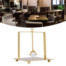 Elegant Golden Napkin Dispenser with Glass Ball