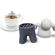 Food-grade, odorless silicone tea strainer filter for herbal tea, shaped like a little man taking a bath in the cup