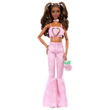 Barbie Deluxe Style Doll #12 in Pink Denim Crop Top with Matching Rose Print Flare Jeans, Wavy Brown Hair, Accessories like Rose Handbag and Jewelry,