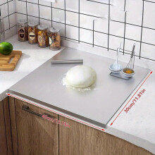 Stainless steel cutting board with edge