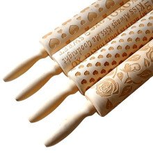 Wooden rolling pin with rose pattern for dough