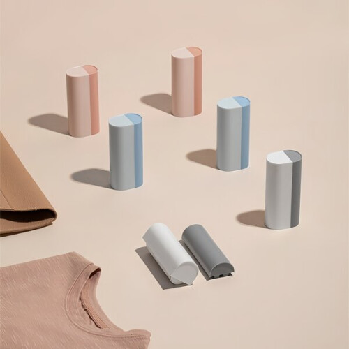 Reusable, adhesive travel lint remover for clothes. 2