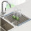 Foldable stainless steel dish drainer over the sink. 4