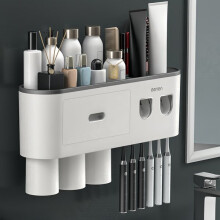 Zahnbürstenhalter mit magnetischen Bechern.