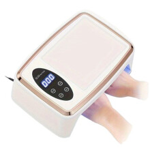 Lámpara compacta para secar uñas.