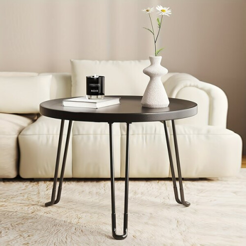 Table d'appoint ronde pliante minimaliste, en plastique. 1