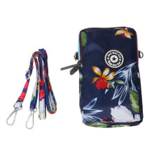 Telefoontasje met ritssluiting en bloemenprint. Modieuze handtas.