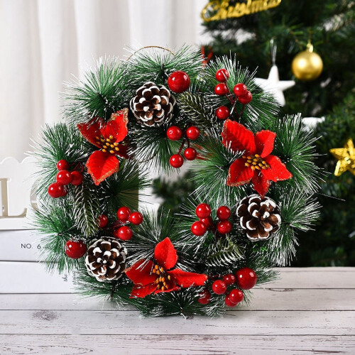 Christmas wreath artificial with pinecones berries flowers