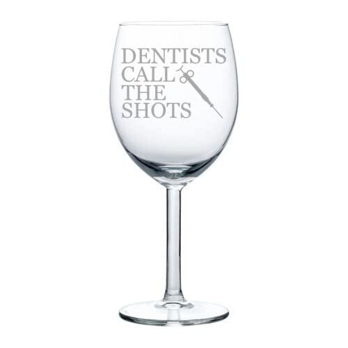 Tandläkare med glas