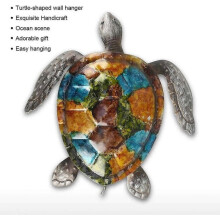 Metalen wandsculptuur van een schildpad voor thuis.