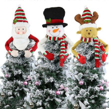 Piezas. Adorno para la punta del árbol de Navidad con forma de estrella y muñeco de nieve antiguo.