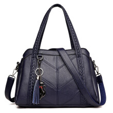 Marineblaue Damenhandtasche aus Leder mit modischen Quasten, maximale Länge < 30 cm