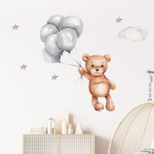 Pegatina de pared infantil con forma de osito de peluche y globos.