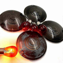 Knipperlichtbehuizing met lens voor Harley Davidson in rookkleurige afwerking.