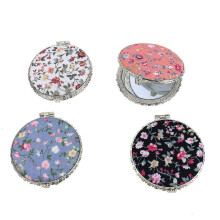 Miroir de maquillage compact de poche pour sac à main, idéal pour les voyages.