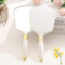 Miroir carré blanc à main avec poignée pour maquillage à domicile, en salon ou en voyage.