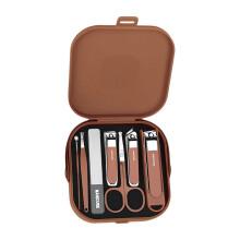 Set manicure da 7 pezzi in acciaio inossidabile color caffè, con tagliaunghie e kit per la cura delle cuticole.