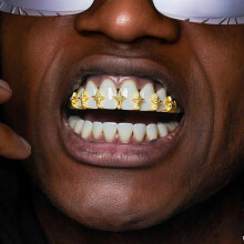 (Golden) Stylish star-shaped zirconia dental braces: single-row openwork gold braces with a star-shaped chain, adjustable size